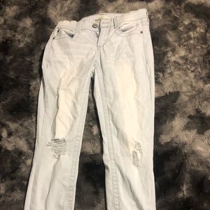 Blue ripped skinny jeans